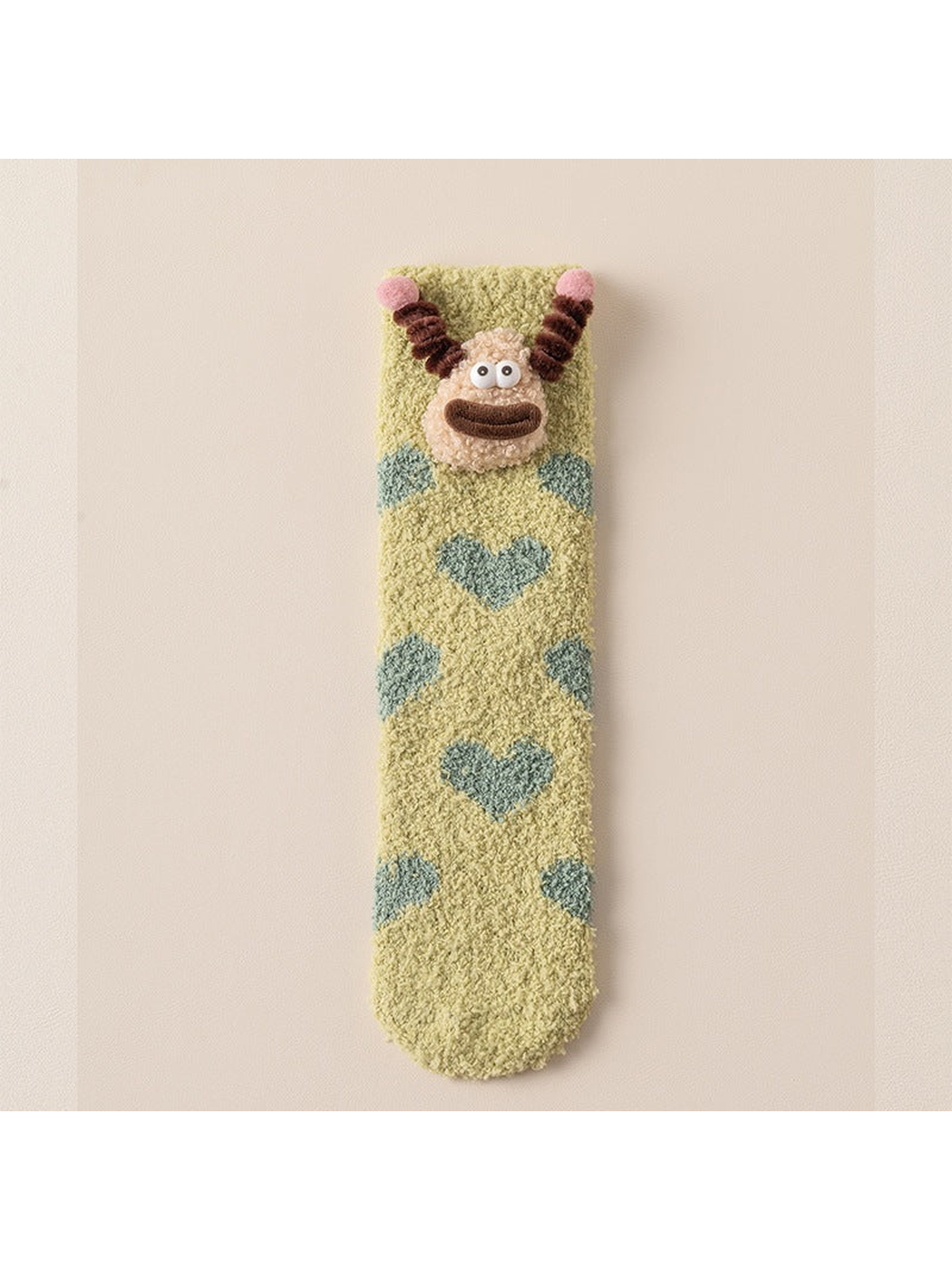 Teal Hearts fuzzy crew sock with cartoon face applique, full view