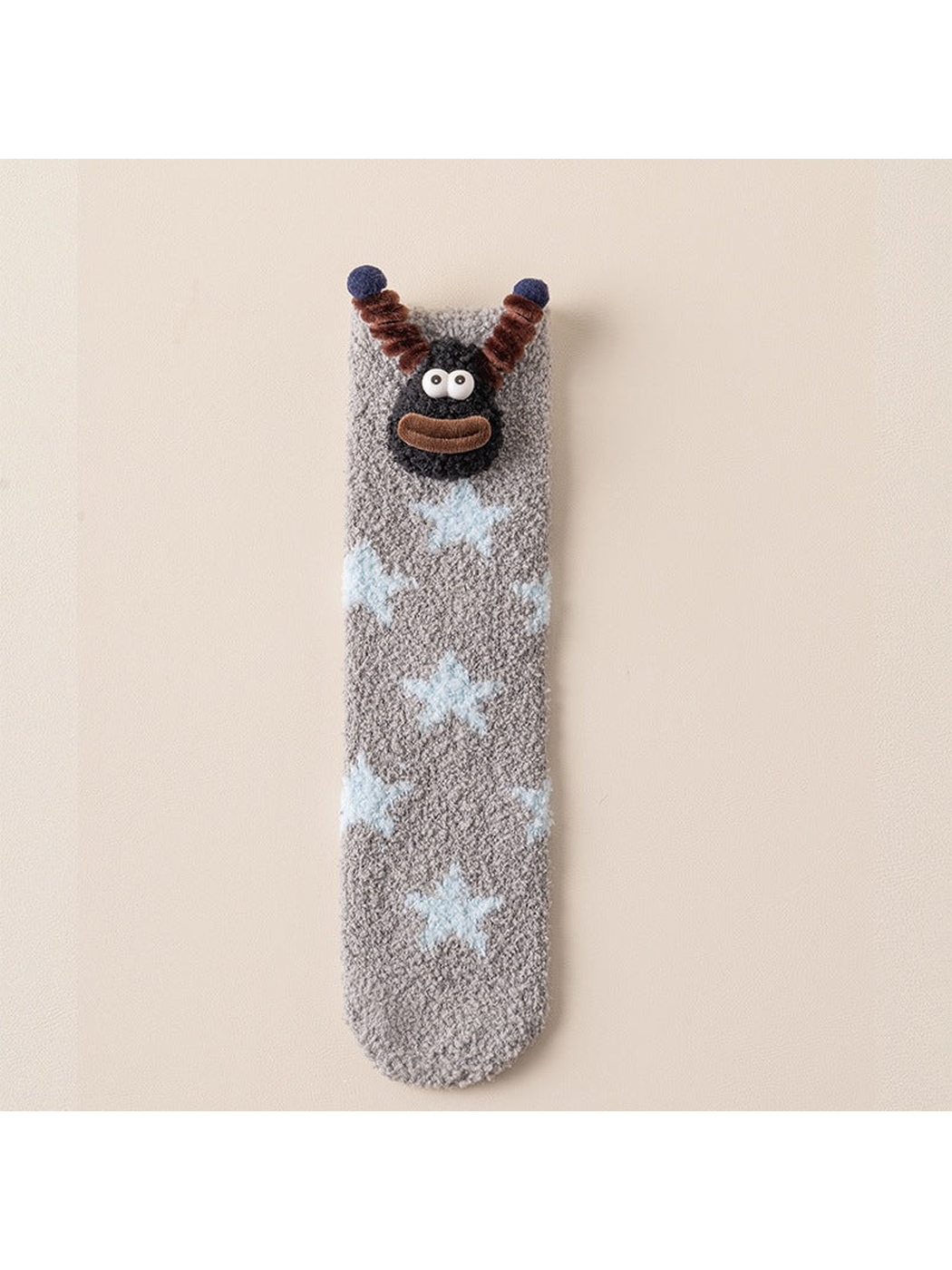 Blue Stars fuzzy crew sock with cartoon face applique, full view