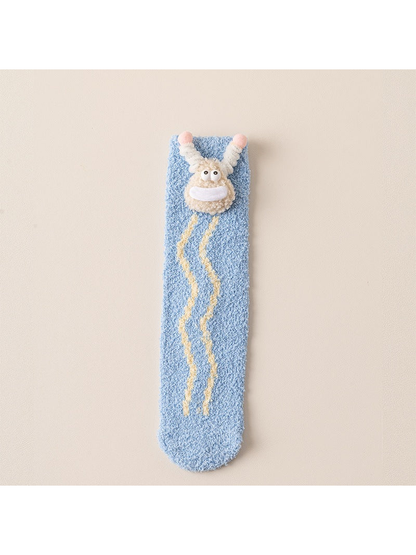 Blue Waves fuzzy crew sock with cartoon face applique, full view
