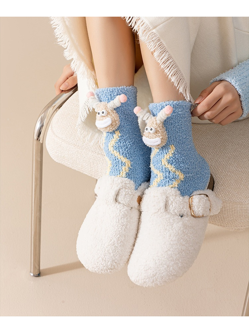Blue Waves fuzzy cartoon crew socks worn while seated