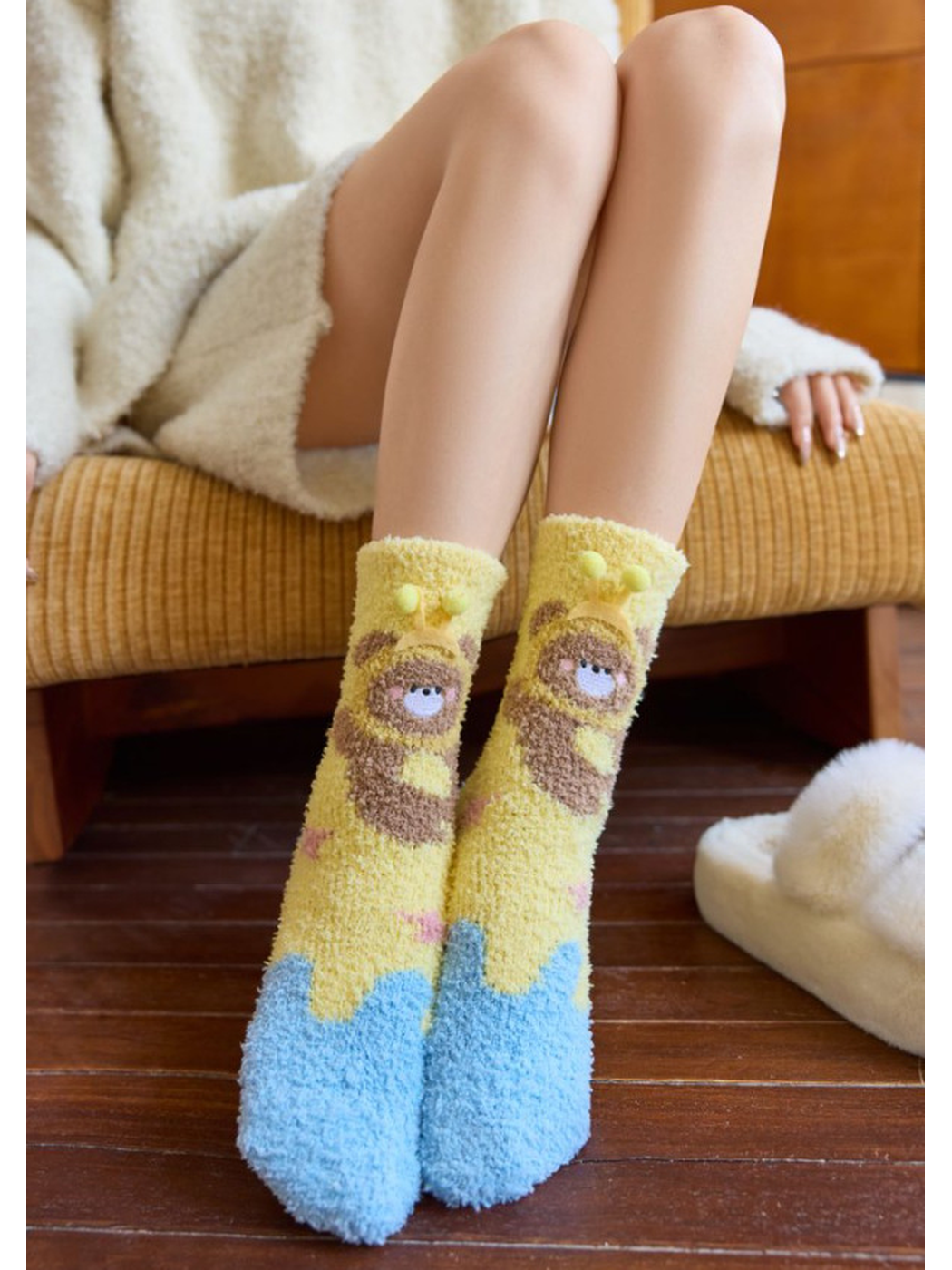 Crowned Character socks worn while seated indoors