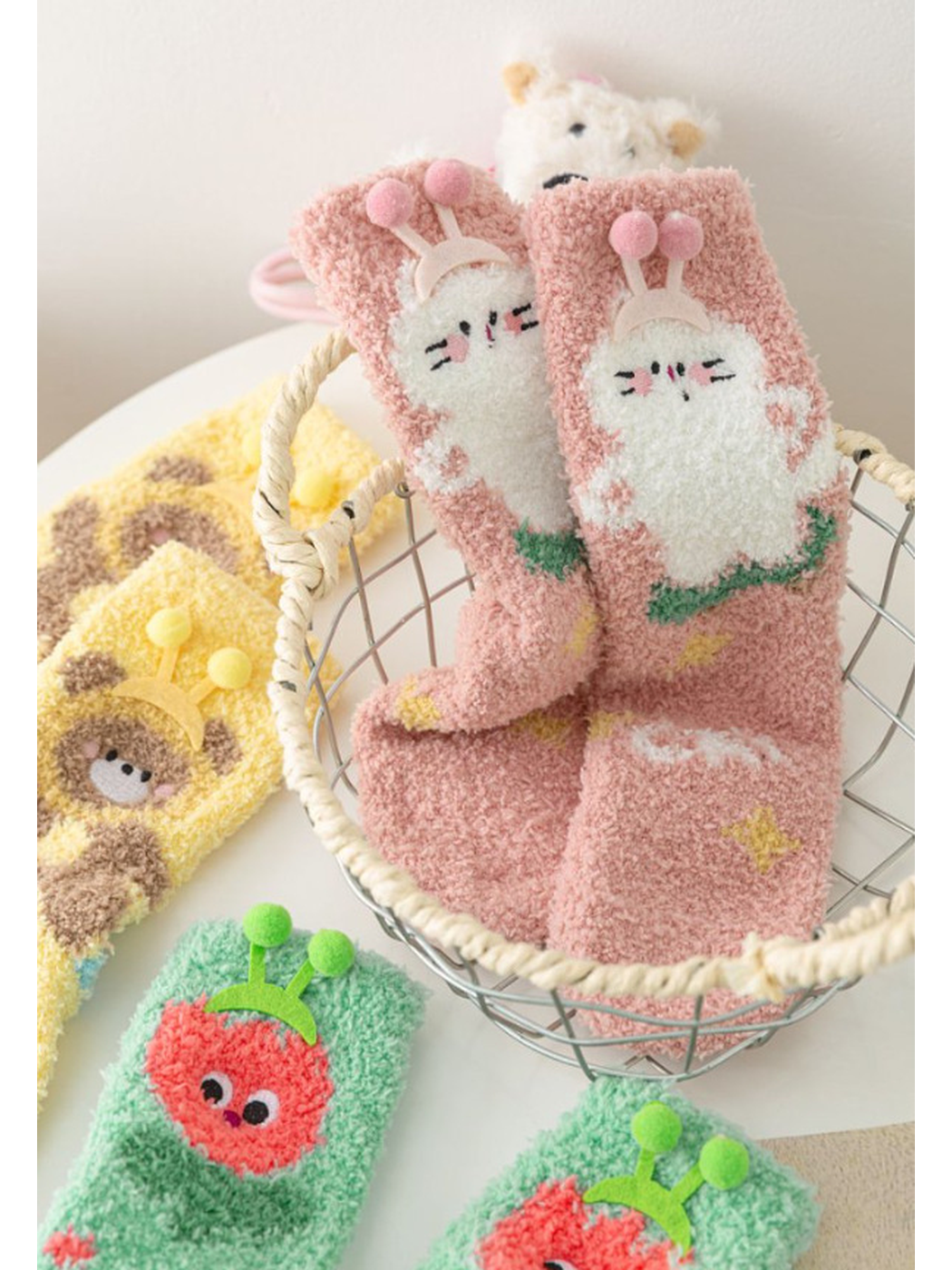 Cat Character socks displayed upright with other character styles nearby