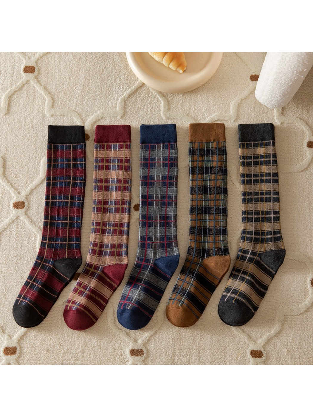 Five plaid knee-high sock colors displayed together