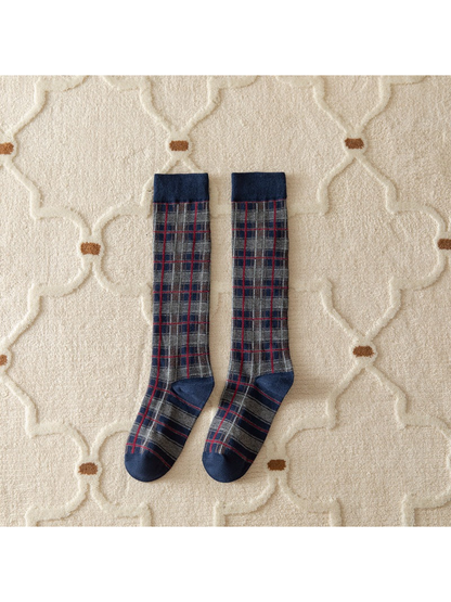 Navy plaid knee-high socks with contrasting cuffs, heels and toes