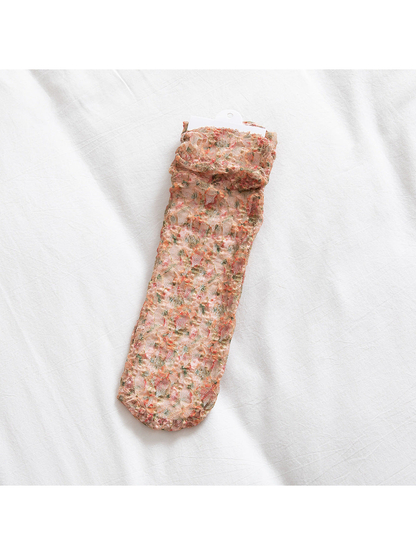 Orange Red floral lace-mesh socks, flat product view