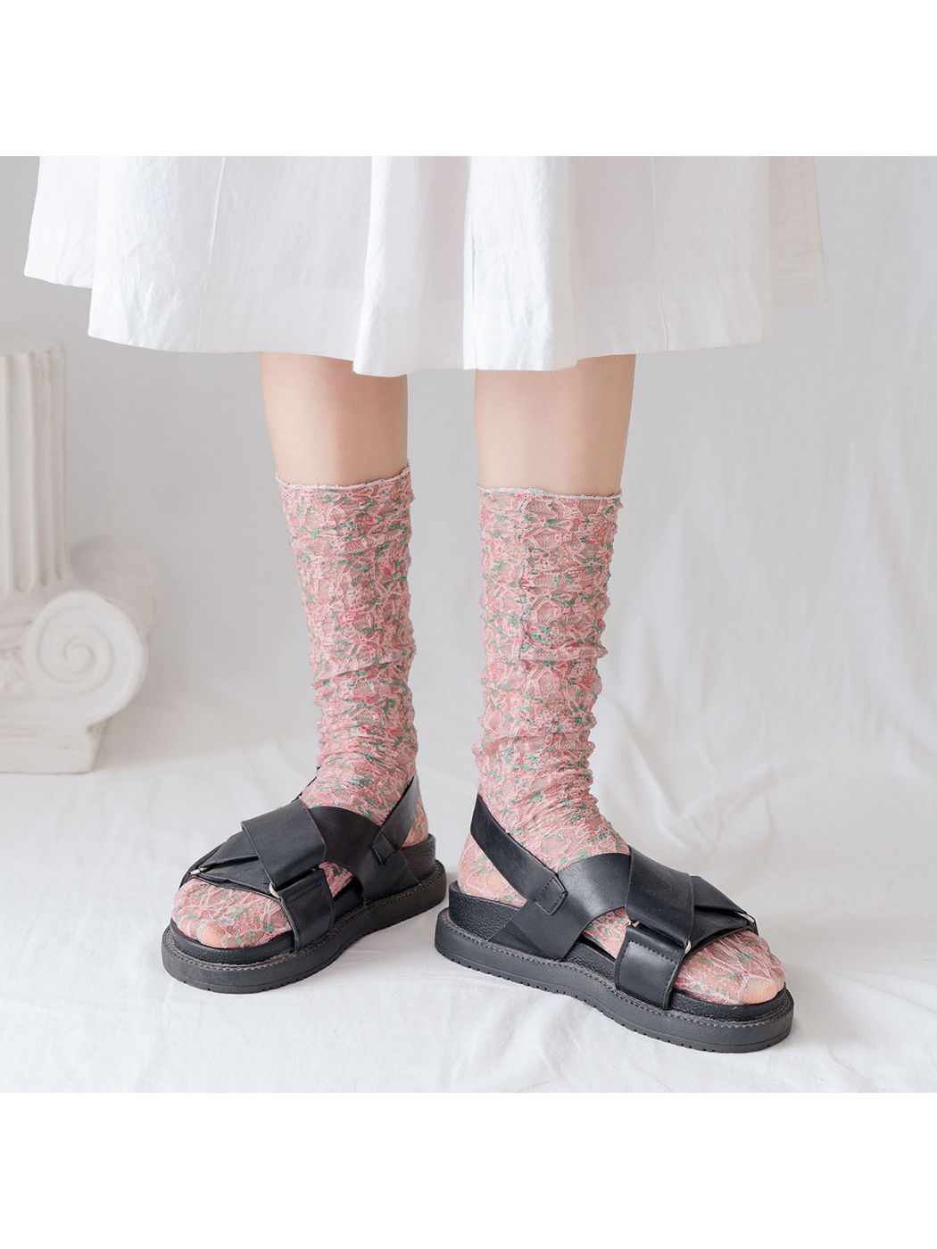 Dusty Pink floral lace-mesh socks styled with black sandals