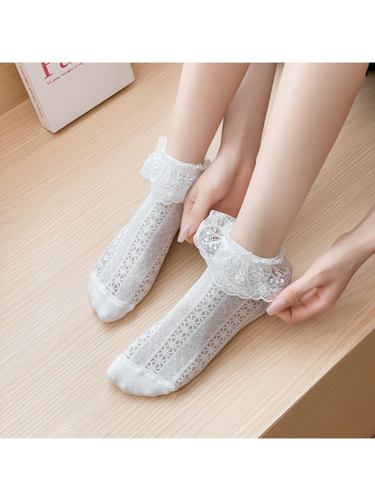 White Lace ankle socks worn while the lace cuffs are adjusted