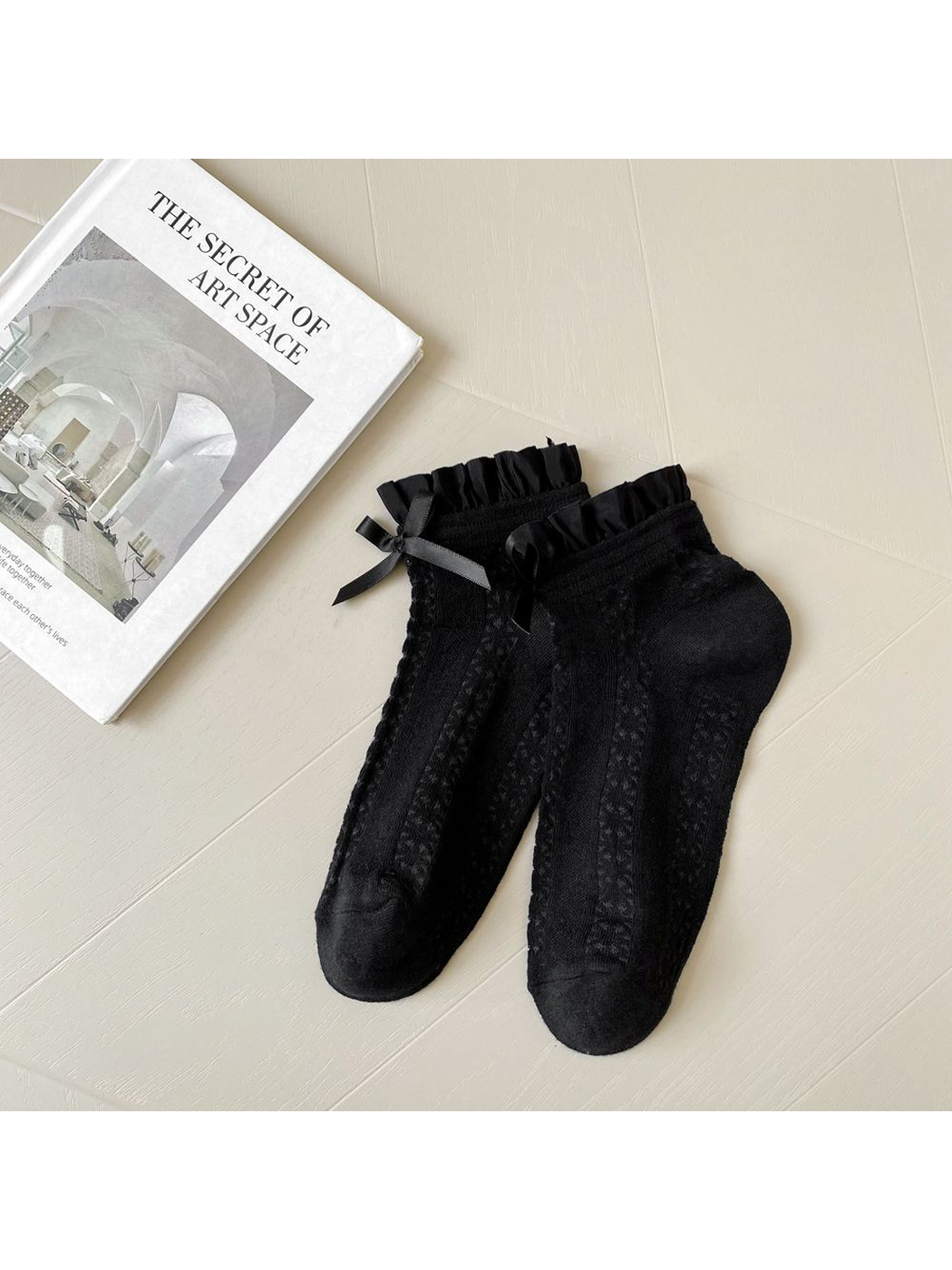 Black Bow ankle socks with ruffled cuffs and vertical openwork panels