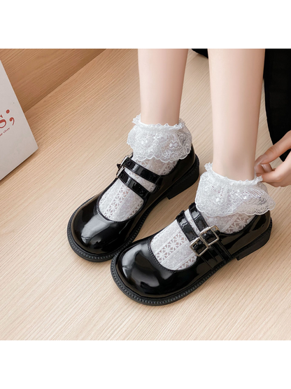 White Lace ankle socks styled with black double-strap shoes