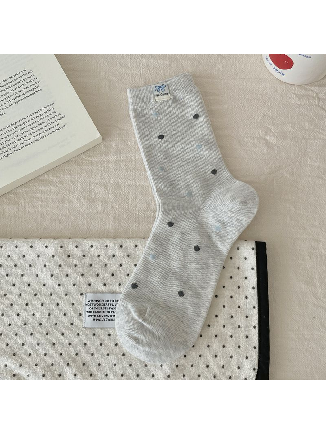 Polka Dots style light gray crew sock, laid flat