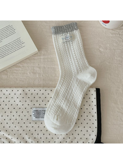 Sheep Label style white crew sock with raised zigzag texture