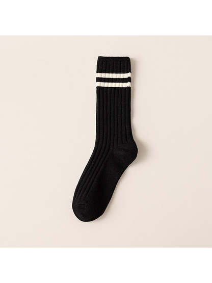 Black ribbed crew sock with two ivory cuff stripes