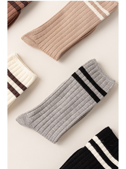 Ribbed striped crew socks in multiple colors arranged together