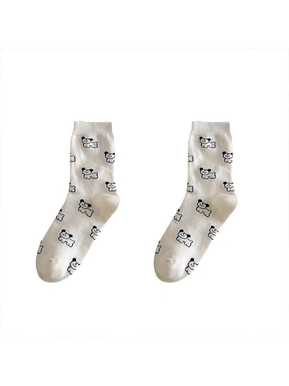Ivory dog-pattern crew socks on a white background