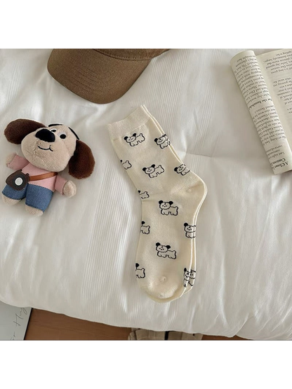 Ivory Dogs crew sock with an all-over outlined dog pattern