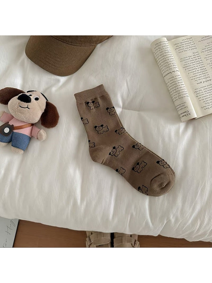 Coffee Dogs crew sock with an all-over outlined dog pattern