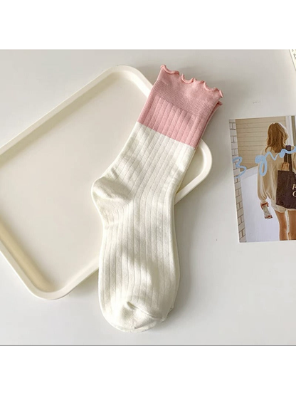 Dusty Pink two-tone ribbed crew sock with a ruffled cuff
