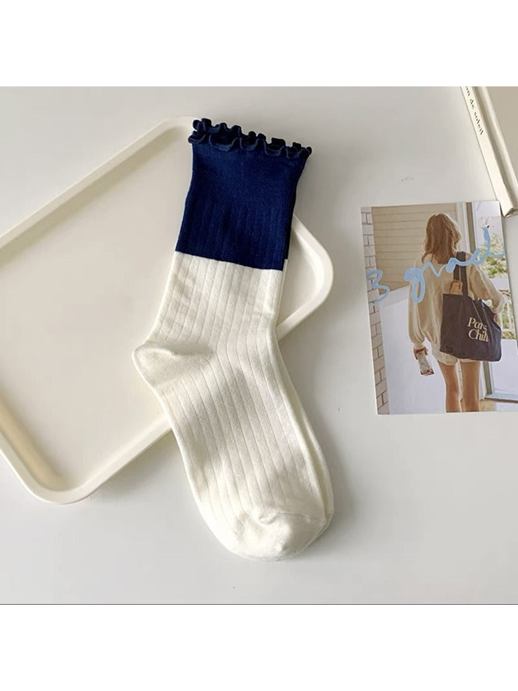 Navy two-tone ribbed crew sock with a ruffled cuff