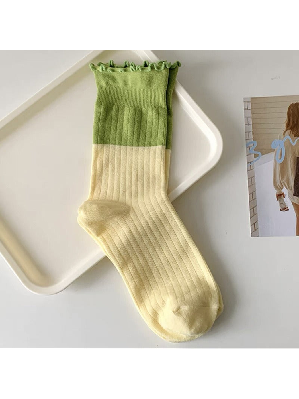 Yellow and green two-tone ribbed crew sock with a ruffled cuff