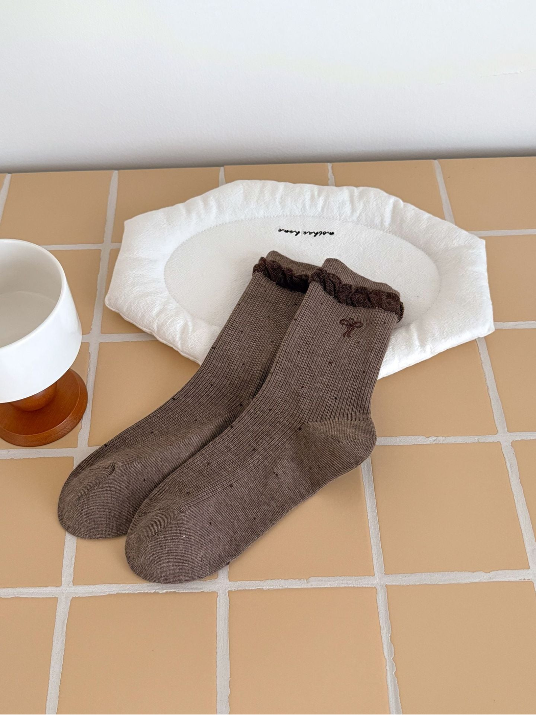 Coffee dotted socks with embroidered bow and dark ruffled cuffs