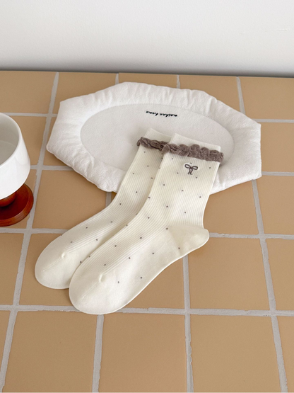 Ivory dotted socks with embroidered bow and taupe ruffled cuffs