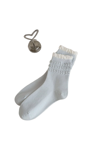 Light blue Triple Loop socks with three looped trim bands and a white ruffled cuff
