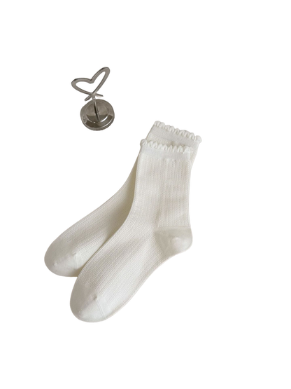 Ivory Scalloped Rib socks with vertical ribbing and looped cuff edges