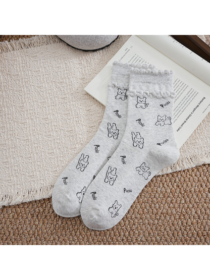 Light Gray crew socks with cartoon dog pattern and ruffled cuffs