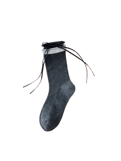 Dark gray crew sock with light gray cuff and black polka-dot ribbon bow