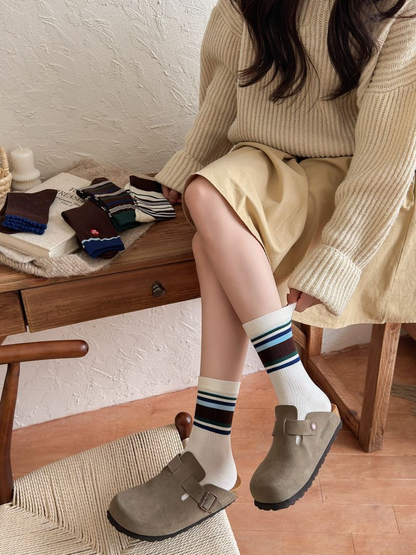 Wide Stripes ivory crew socks styled with clogs
