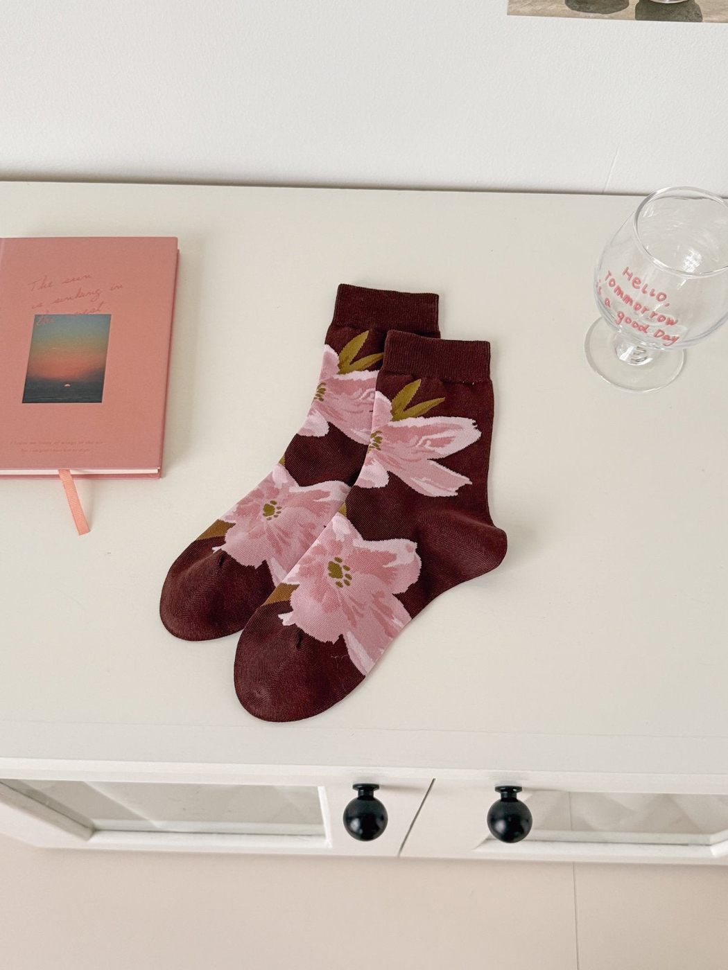 Oversized Blossoms burgundy crew socks with large pink flowers