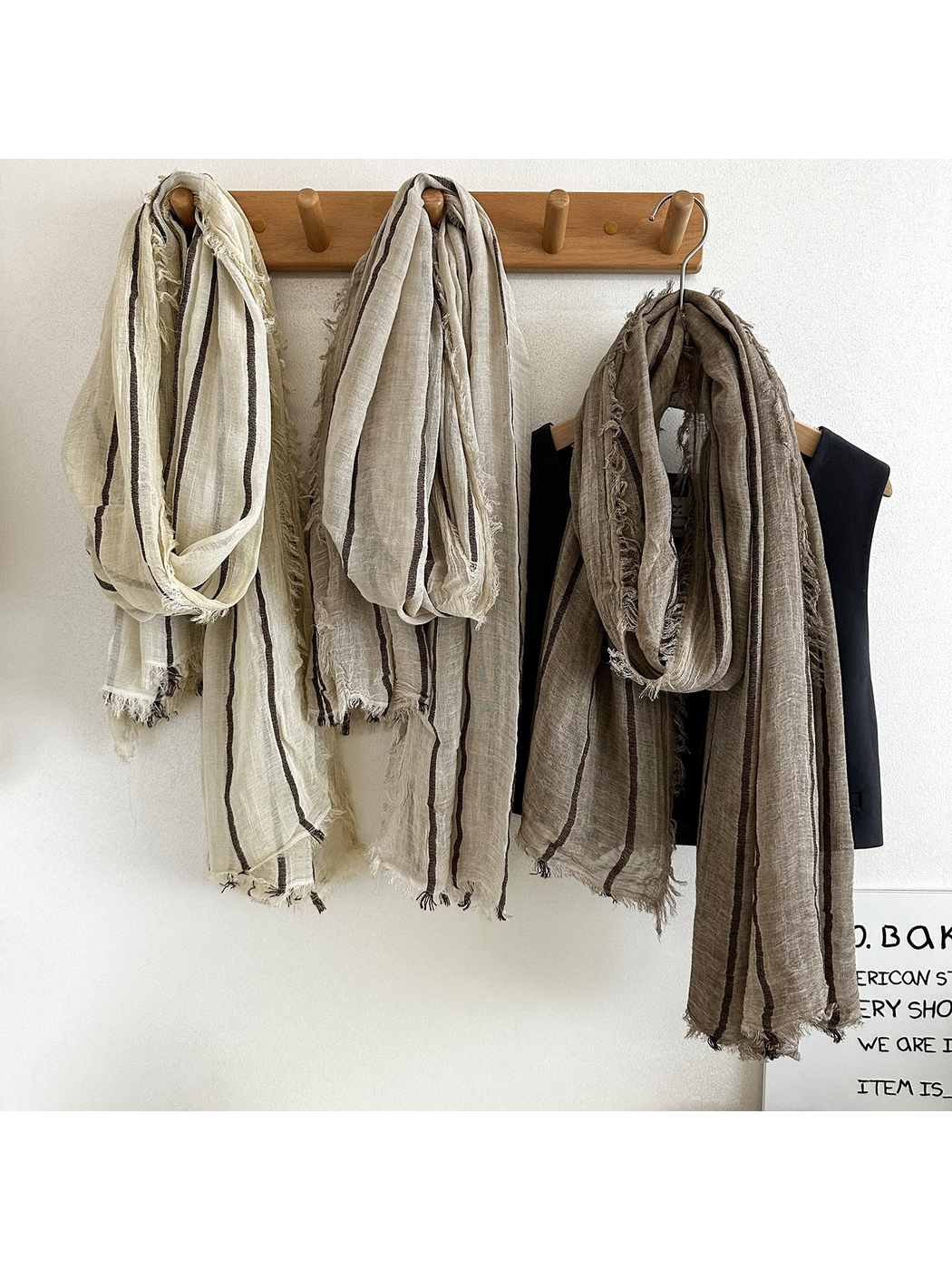 Dark Brown, Off White and Khaki striped scarves hanging together
