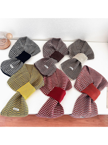 Six striped scarves displayed together in assorted color combinations