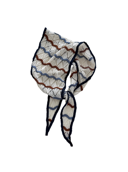Ivory openwork triangle scarf with navy edging and wavy stripes
