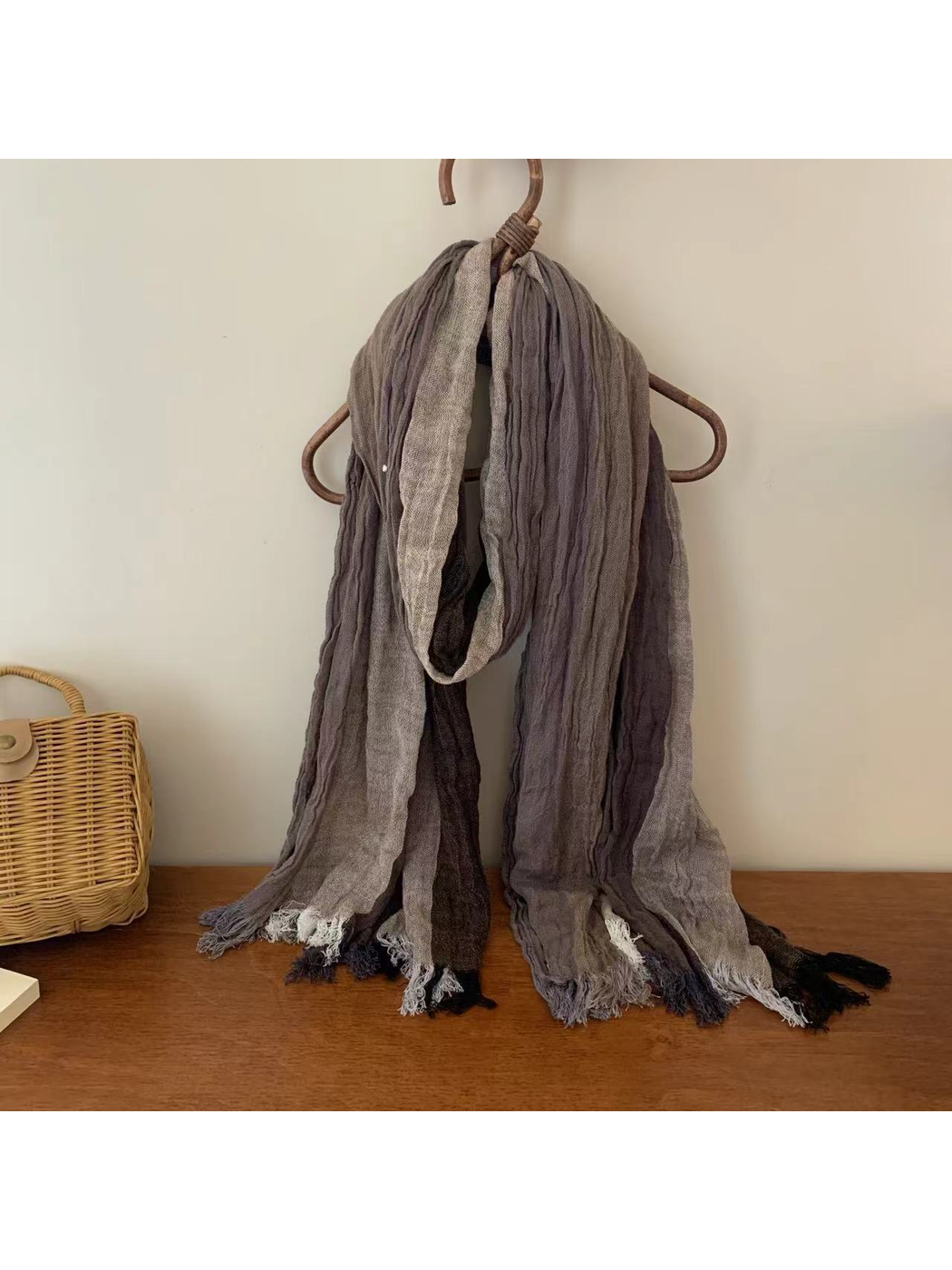 Crinkled multicolor scarf in layered gray, taupe and charcoal tones with fringed ends