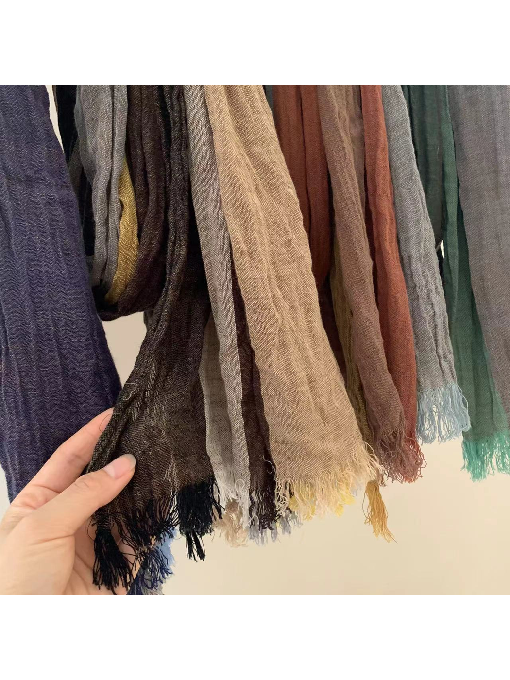Close-up of multicolor scarf panels and short fringed ends