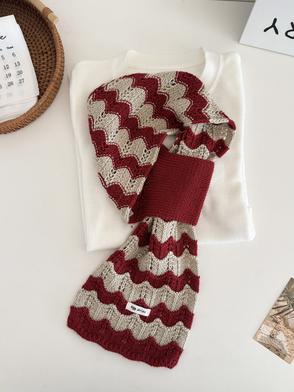 Khaki and red wavy knit pull-through scarf displayed flat