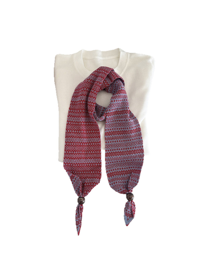 Red / Blue geometric-pattern narrow scarf with bead accents, flat display