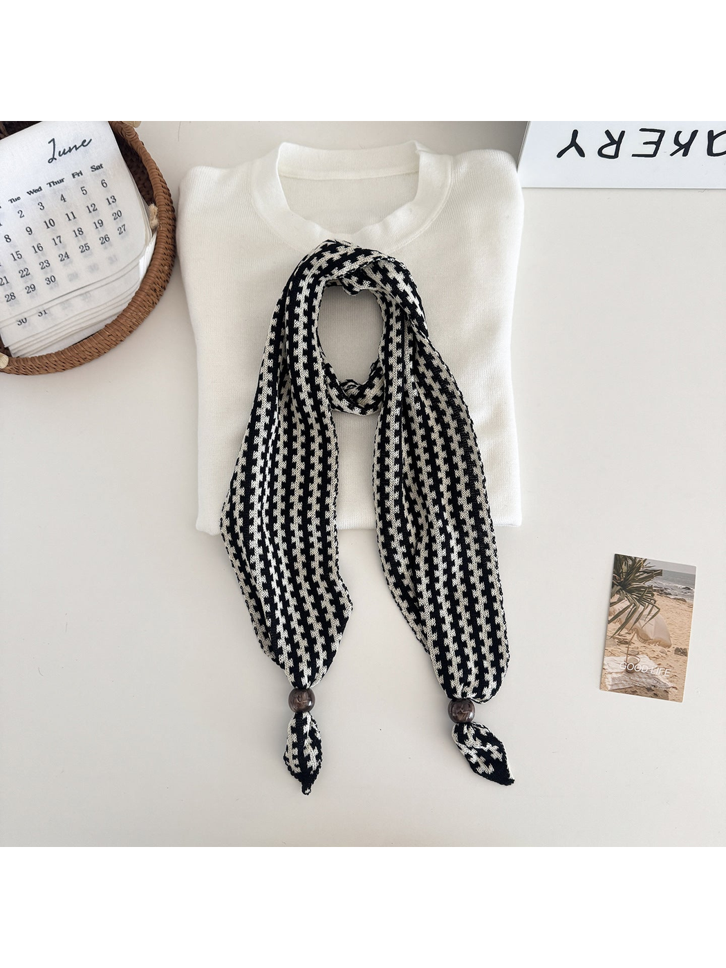 Black / White narrow patterned scarf with dark round end beads
