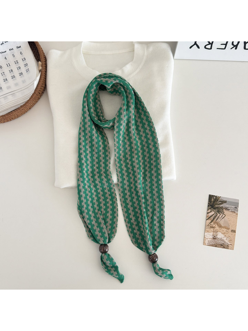 Green / Greige narrow patterned scarf with dark round end beads