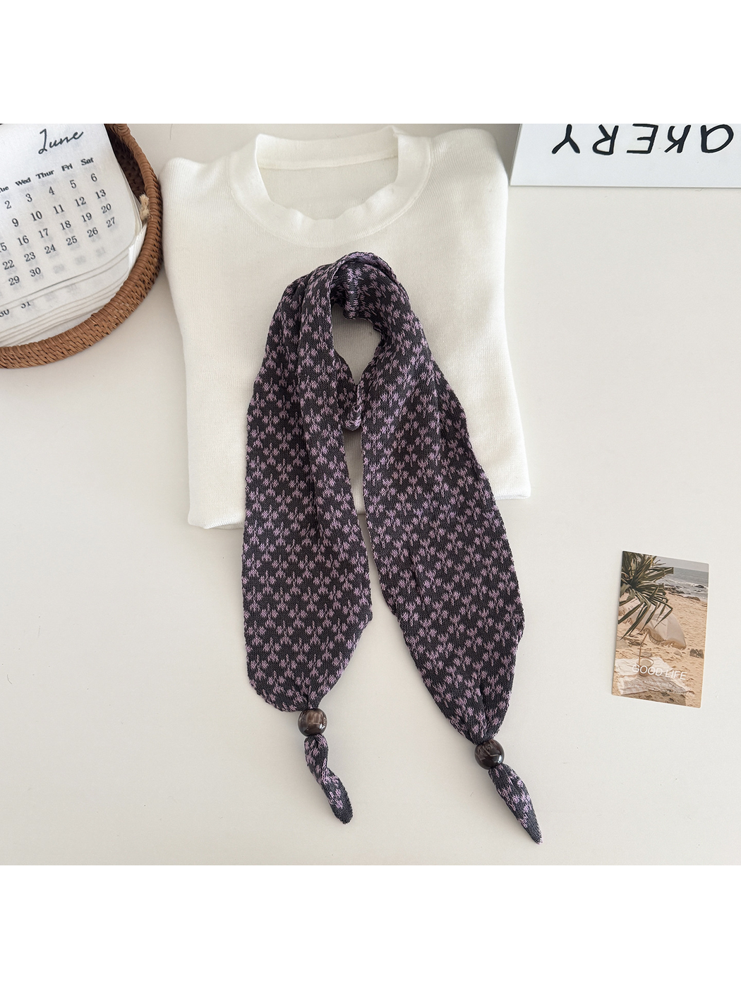 Gray and pink patterned narrow scarf with beaded tapered ends