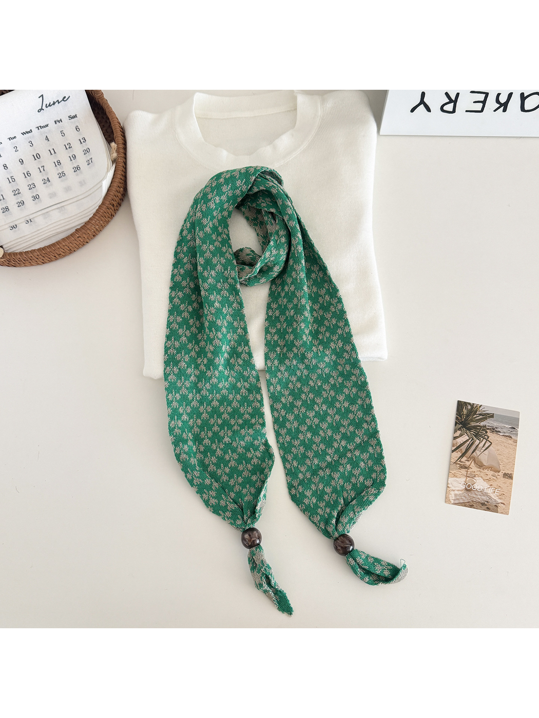 Dark green patterned narrow scarf with beaded tapered ends