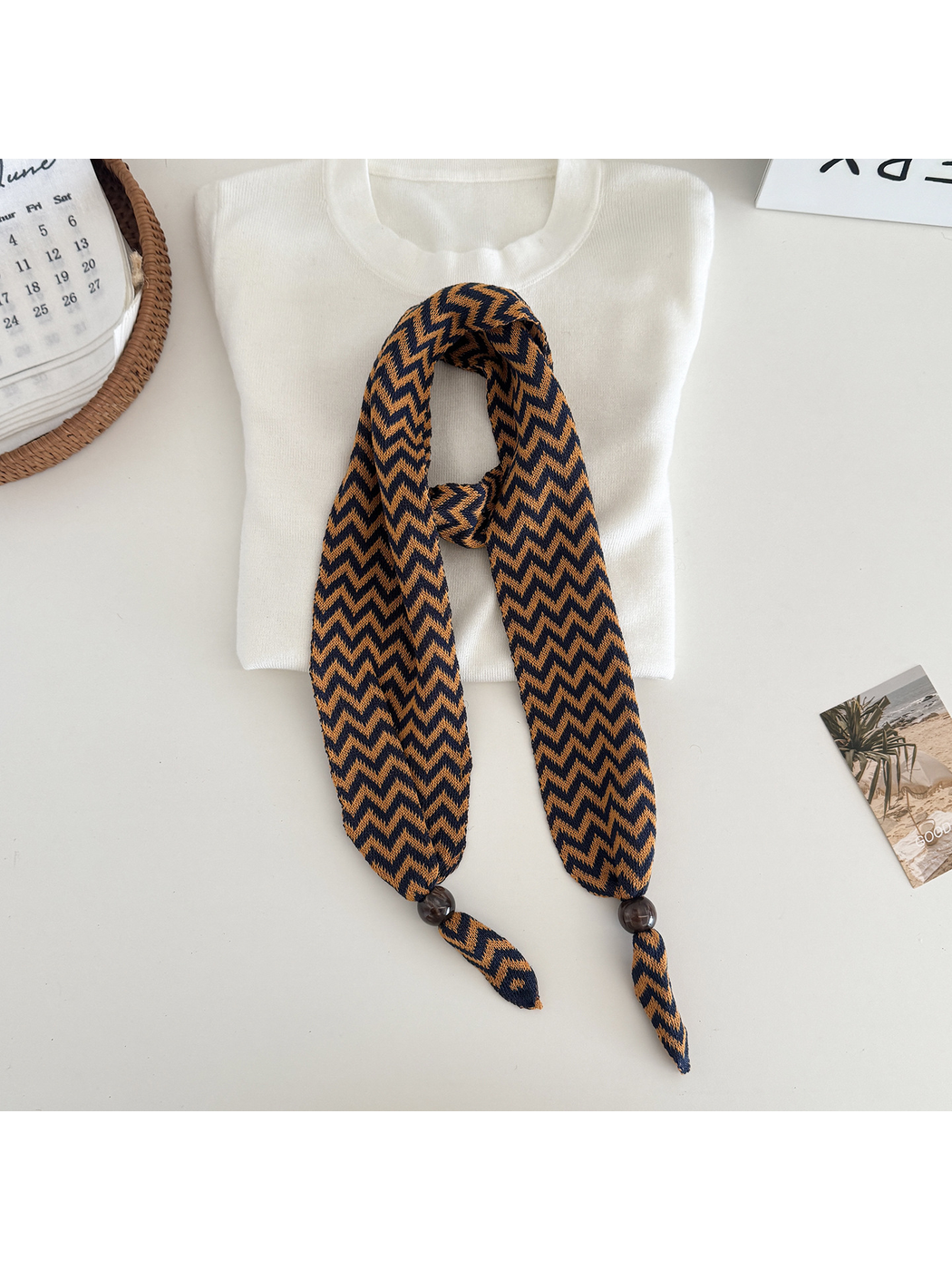 Caramel zigzag scarf with bead-accented pointed ends