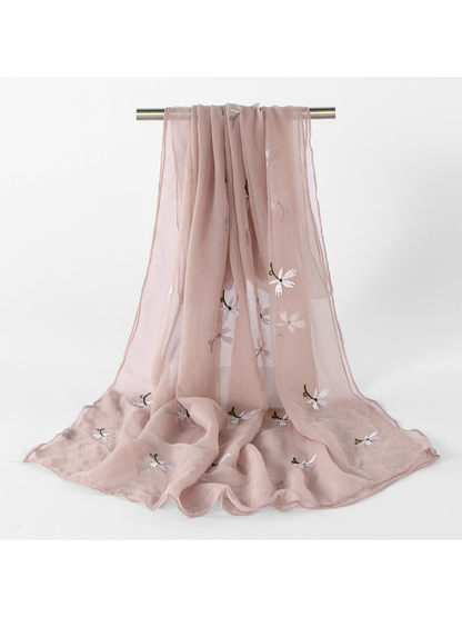 Dusty Pink sheer scarf with scattered white floral embroidery, draped view