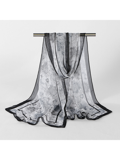 Black Botanical sheer scarf displayed in a full draped view