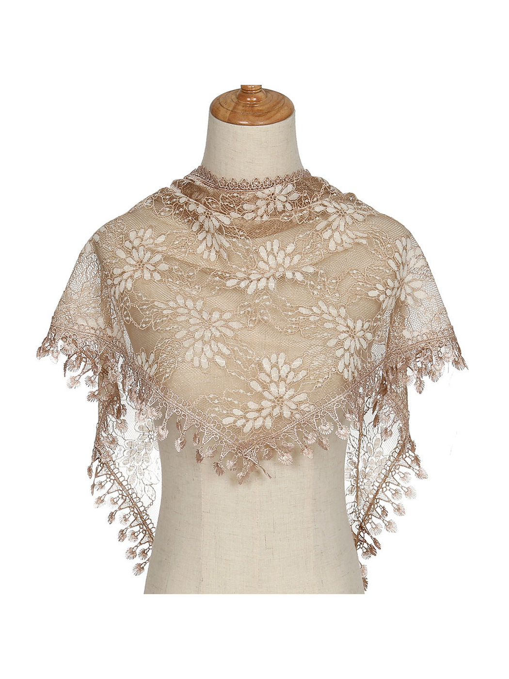 Beige floral lace triangle scarf with decorative fringe on mannequin