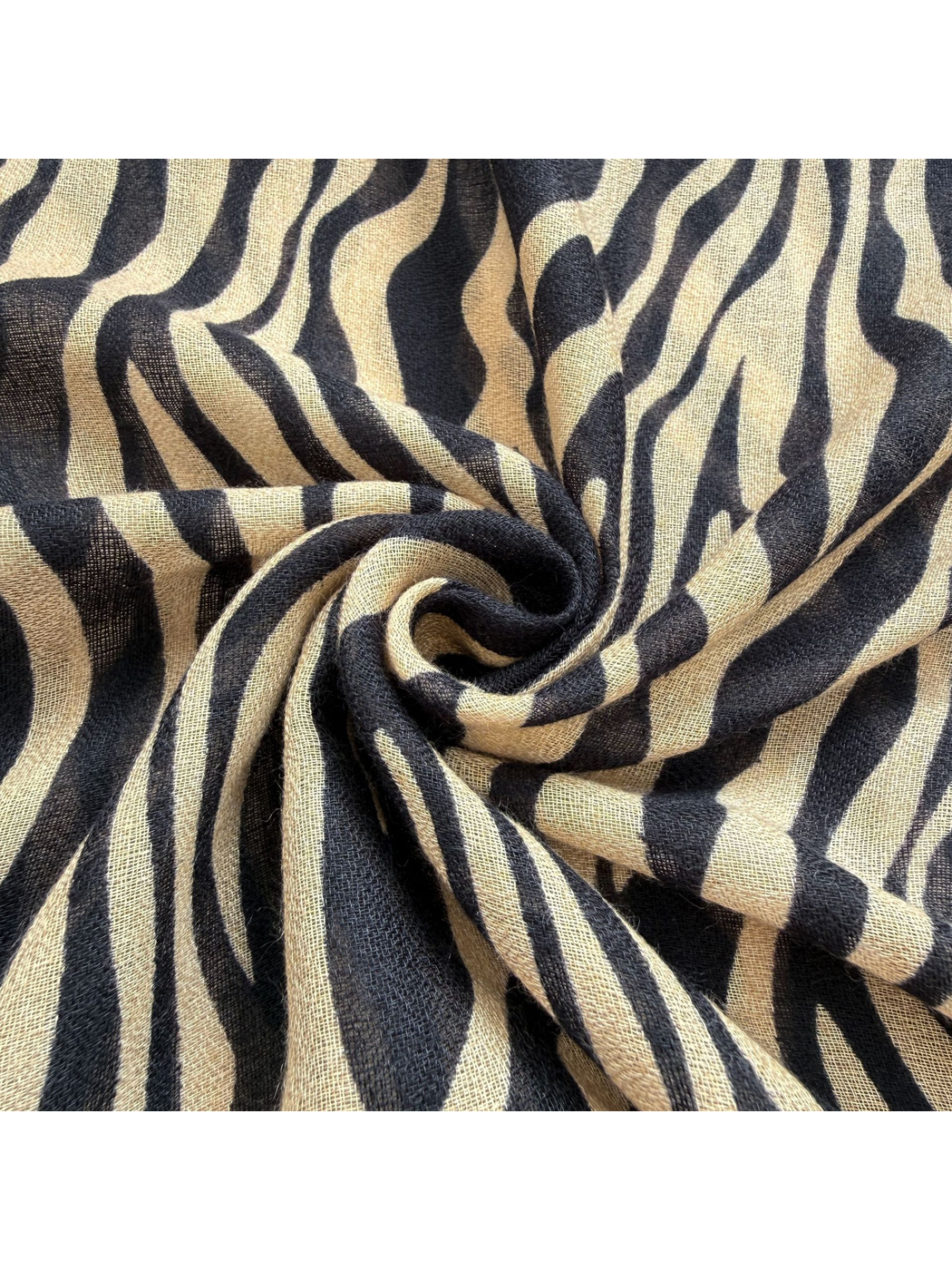 Close-up of the Brown scarf's semi-sheer woven-look texture and animal-stripe pattern