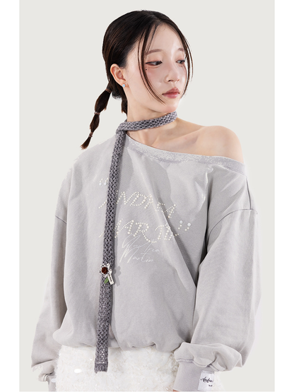 Heather Gray skinny scarf styled in a long single-loop drape