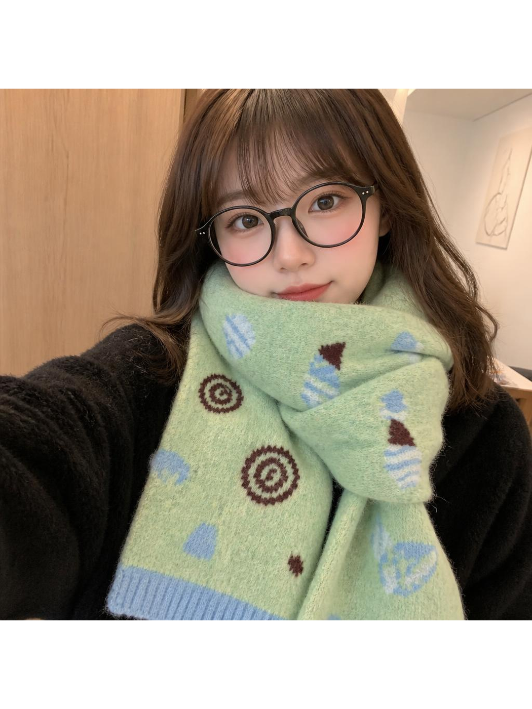 Ice Cream patterned scarf worn in a close-up indoor setting