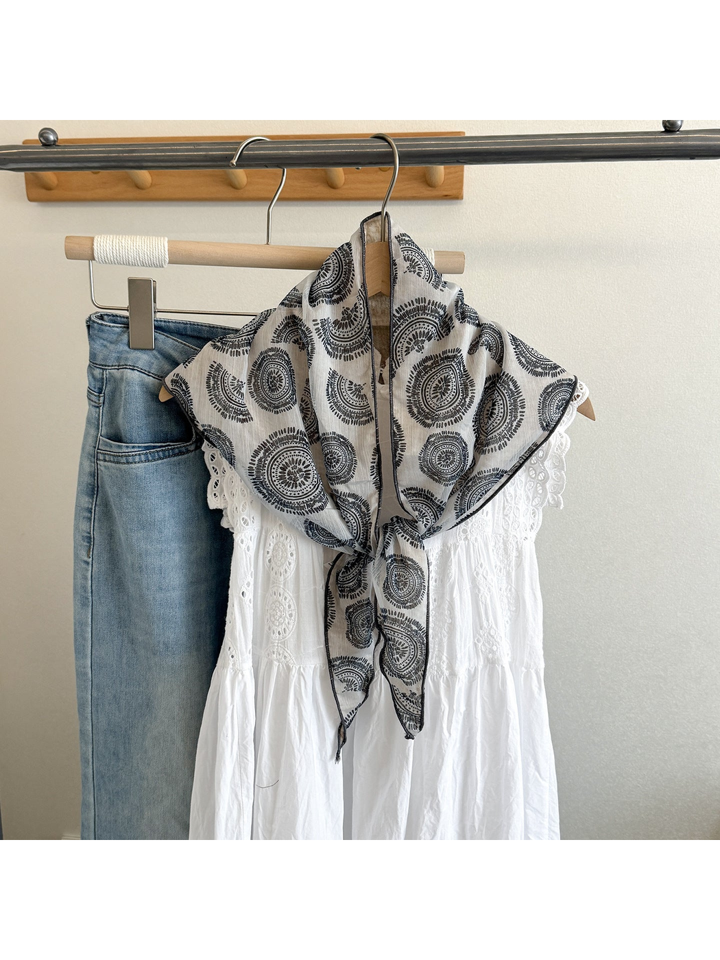 Blue Medallion triangle scarf styled over a white dress